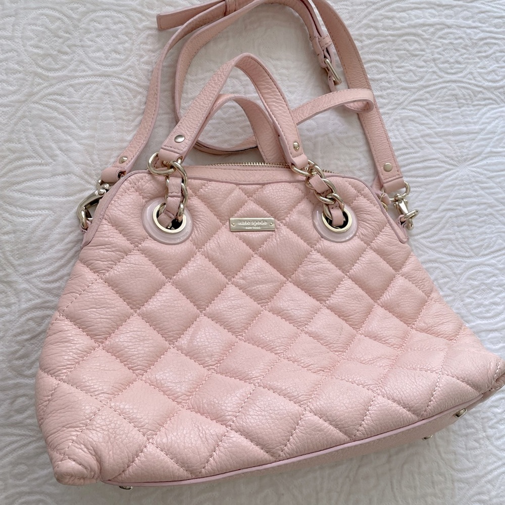 Pink quilted Kate spade purse.